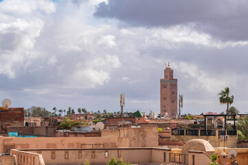 View of rooftops of Marrakech close to the city centre. Koutoubia Mosque minaret during a rare...