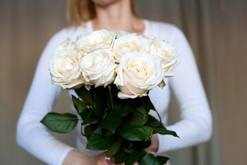beige roses bouquet. Beautiful Rose Bouquet in woman hands