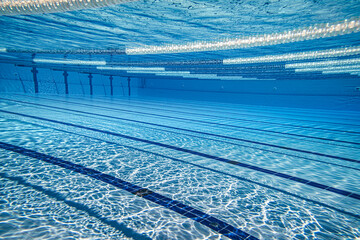 Sport & Recreation: Olympic Swimming pool under water background.