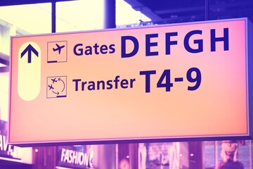 Airport signs in Amsterdam, Netherlands. Retro filter style.