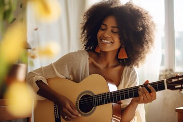 African woman playing guitar musician performance recreation. - obrazy, fototapety, plakaty