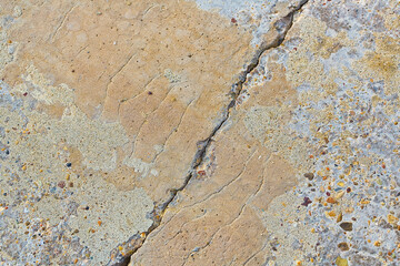 Cracked and damaged concrete wall