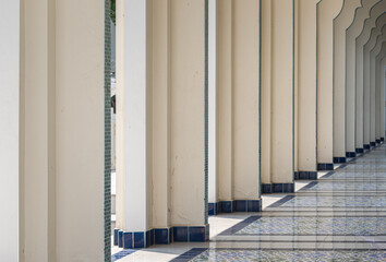 Interior diminishing perspective view of pillars and hallway in Bang O Mosque. Space for text,...