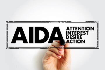 AIDA (marketing) Attention Interest Desire Action - one of a class of models known as hierarchy of effects models, acronym text concept stamp