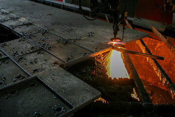 Industrial Laser cutting metal with sparks