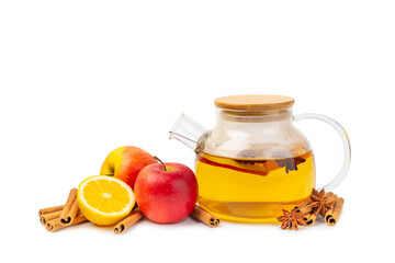 Fragrant hot tea with cinnamon stick and anise isolated on a white background. A teapot brewing hot tea with honey, lemon, mint and apples. Spicy tea with spices. Immunity tea. Health concept.