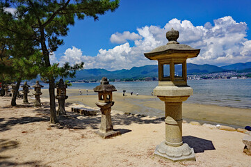 Stone lantern at Itsukushima Shrine, a world heritage site, Hatsukaichi City, Hiroshima Prefecture,...