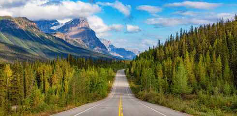Scenic Highway in Canadian Rocky Mountains. Sunny Cloudy day. Banff, Alberta, Canada