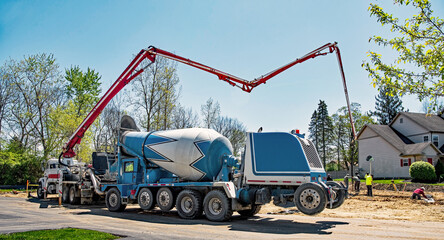 Concrete Boom Pump Truck Delivering Concrete for Building Footer