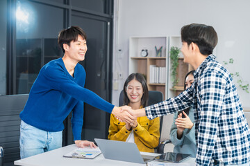 university classroom, diverse group of young students Asian collaborate study together, sharing...
