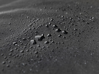 water drops on paper Tyvek. waterproof material.
