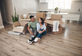 Break, couple and smile in new home with boxes for moving in, satisfied and confident with ownership. House, relationship and happy with unpacking furniture, excited and positive with property - obrazy, fototapety, plakaty