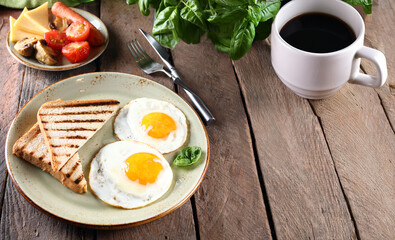 traditional breakfast with eggs salad and toast