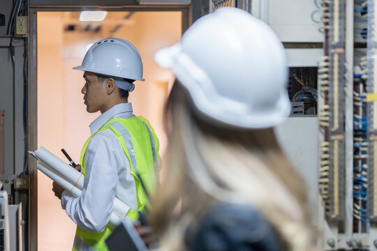 In the fast-paced energy sector, power plants represent the nexus of innovation, where male and female engineers collaborate to address the world's energy challenges.