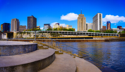 St. Paul City skyline and landmark buildings over Mississippi River in Minnesota, United States, from Raspberry Island at Harriet Island Regional Park