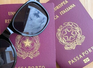 European Union passports with sunglasses.Organizing a trip.Documents ready to go.Studying...