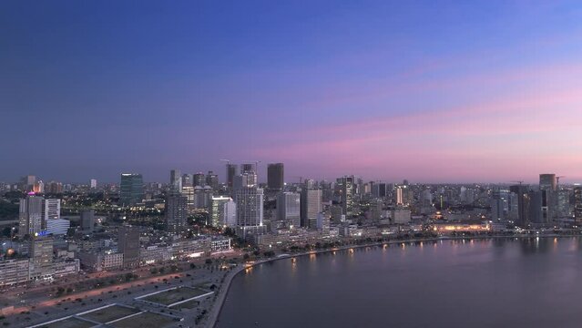 Aerial footage of downtown Luanda, Angola at night or at the end of the day.