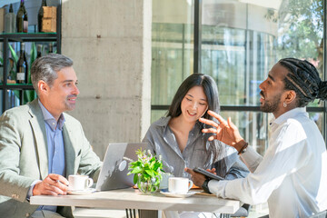 Multiethnic group of people having a work meeting in the office
