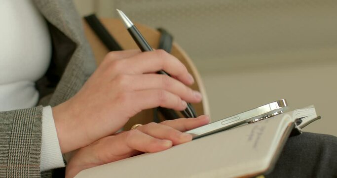 Close-up of a person's hand reveals a sense of anticipation, with body language indicating impatience. Business person hand nervously tapping on a surface as feeling of restlessness or urgency.