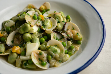 Beans with peas and clams. Traditional tapa from northern Spain.