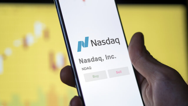 April 09th 2024 , New York City, New York. Close up on logo of Nasdaq, Inc. on the screen of an exchange. Nasdaq, Inc  price stocks, $NDAQ on a device.