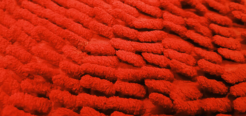 Red velvet fabric background in a luxurious style for graphic design