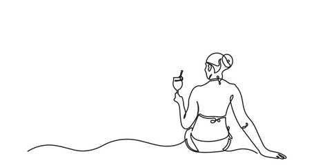 Continuous line drawing of a slender young woman sitting on the beach and holding a cocktail. Back view girl enjoys summer vacation. One-line drawing vector illustration.