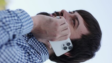 Talking on the phone on the street