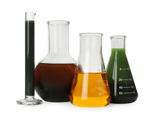 Laboratory glassware with different types of crude oil isolated on white