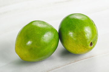 Two ripe green exotic avocado fruit