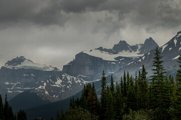 Storm clouds and rain fall over the Rockies Ice Fields Parkway Banff National Park Alberta Canada