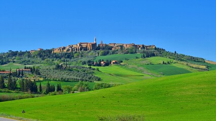 panorama of the Tuscan countryside in the Val d'Orcia in the province of Siena, Italy with the city...