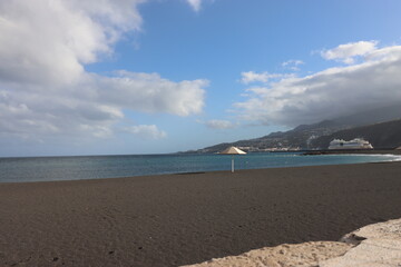 Playa on the canary island La Palma with a single sunshade