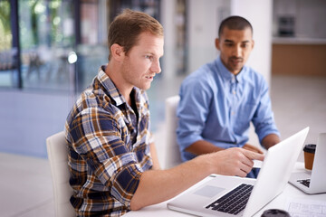 Office, businessman and pointing on laptop with connection issue, update problem or website glitch. Business people, colleague or software developer with computer for internet or network inspection