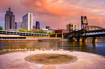 St. Paul City sunset skyline and landmark buildings over the Mississippi River in Minnesota, United States, from Raspberry Island at Harriet Island Regional Park