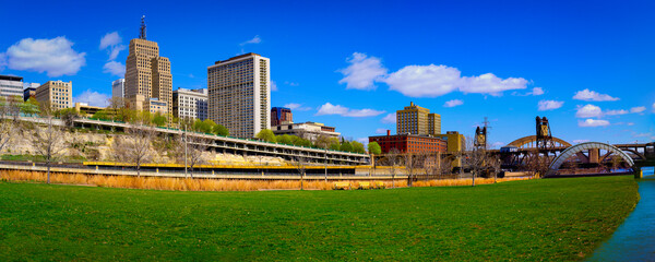 St. Paul City skyline and landmark buildings over Mississippi River in Minnesota, United States, from Raspberry Island at Harriet Island Regional Park
