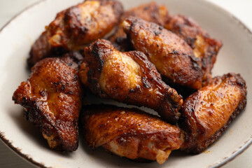 Chicken wings marinated with spices in an American restaurant.