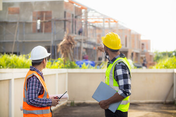 Architects and designers are talking about Construction plans before being delivered to the...
