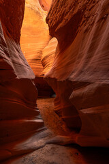 Antelope Slot Canyons in Arizona formed by cracks that were widened by millions of years of water...