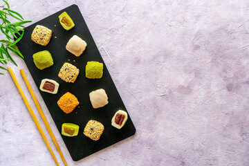 Artistic Top View of Mochi Selection on Slate