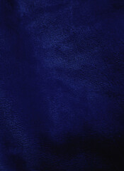 Blue velvet fabric background in a luxurious style for graphic design
