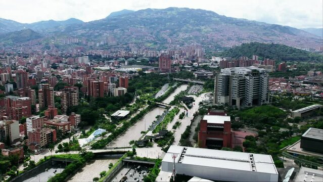 Traffic on highway next to the Medellin river.