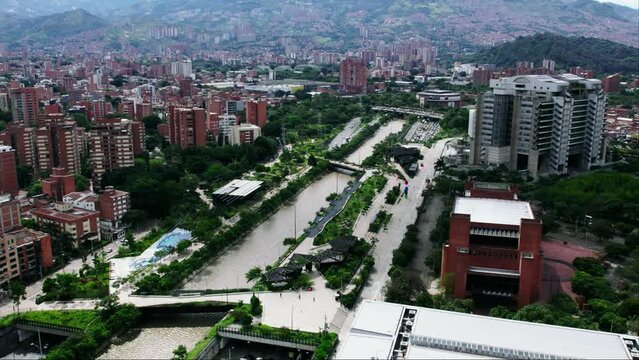 Traffic on highway next to the Medellin river.