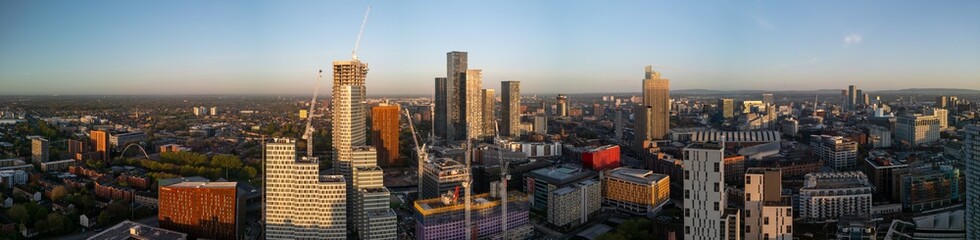 Aerial view of Manchester cityscape with towering skyscrapers