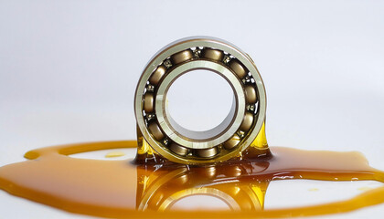 Power transmission bearing, in lubrication oil drip,  background; transmission maintenance and industry business