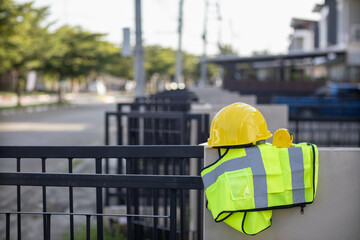 Yellow safety helmet are provided along with reflective vests for workers wear because Yellow...