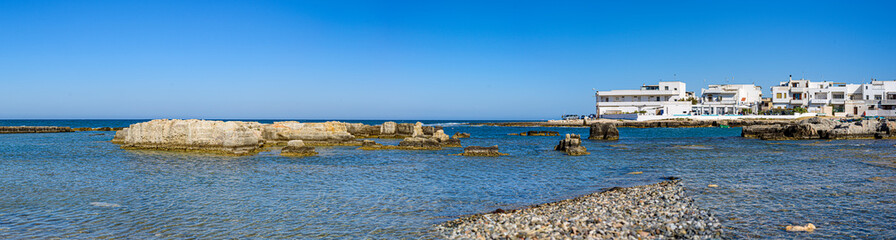 San Vito, Polignano a Mare, Bari, Puglia, Italy with blue sea, boat,, cactus, Mediterranean landscape