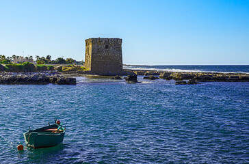 Watchtower, beautiful old tower in San Vito, Polignano a Mare, Bari, Puglia, Italy with blue sea,...