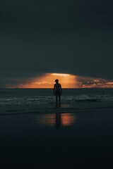 silhouette of a men on the beach