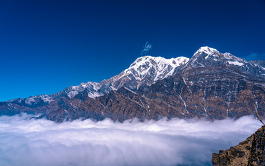 landscape view of snow covered mount Annapurna range in Nepal.